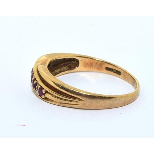 154 - 9ct gold ladies Ruby and Diamond twist ring 3g size R