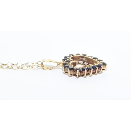 160 - 9ct gold Sapphire heart shape pendant necklace chain is 40cm long