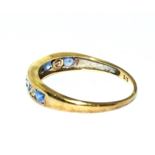 161 - 9ct gold Diamond and Tanzanite 1/2 eternity hall marked as Diamond in the ring  ring size O