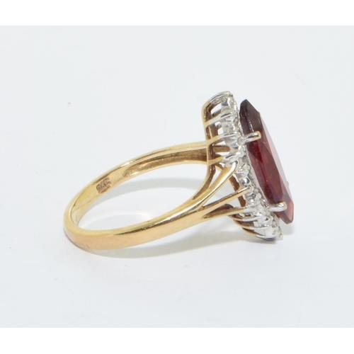 163 - 9ct gold ladies Ruby lozenge shape halo cocktail ring size N