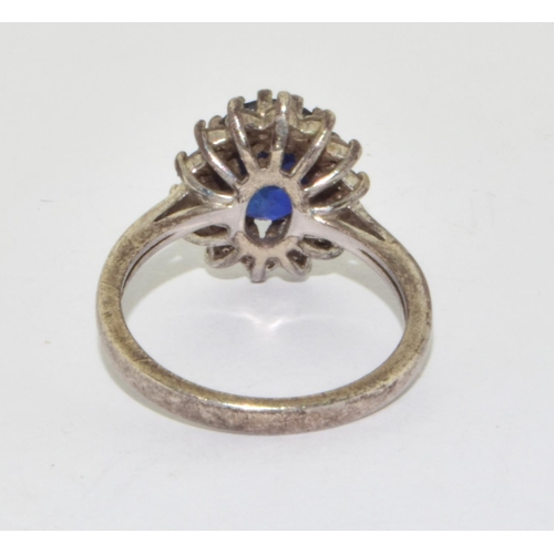 245 - 925 silver Ceylon sapphire colour blue halo design ring size N