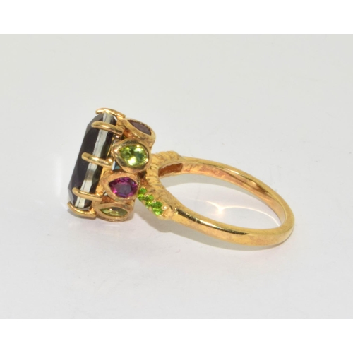 257 - 925 silver gilt large Semi precious stone  deigned ring with matching  stones to the shank... 