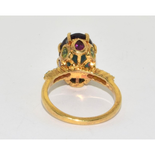 257 - 925 silver gilt large Semi precious stone  deigned ring with matching  stones to the shank... 