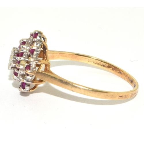 291 - Diamond and Ruby large style cluster Hall marked diamond in ring in 9ct gold size T