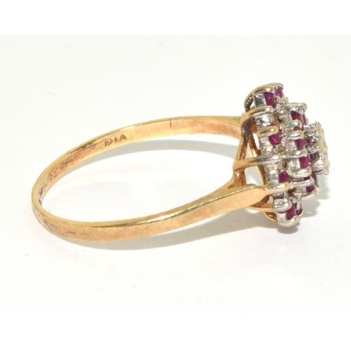 291 - Diamond and Ruby large style cluster Hall marked diamond in ring in 9ct gold size T