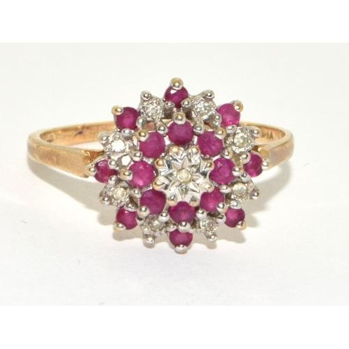 291 - Diamond and Ruby large style cluster Hall marked diamond in ring in 9ct gold size T