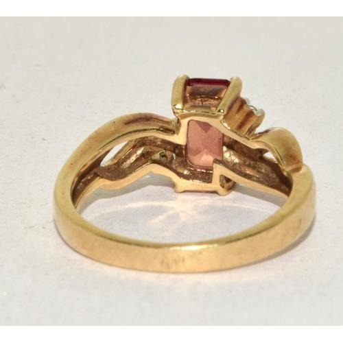 293 - 9ct gold ladies Diamond and Ruby coloured ring size N