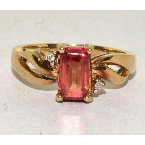 293 - 9ct gold ladies Diamond and Ruby coloured ring size N