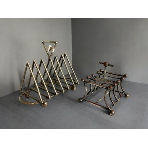 264 - A collection of four 19th century silver plate toast racks. Christopher Dresser style designs. Inclu... 