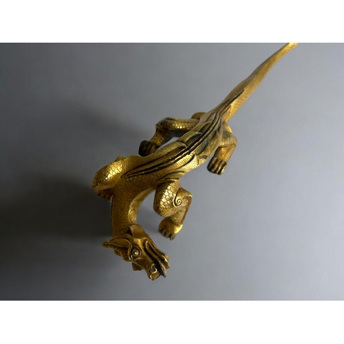 2 - Two Chinese gilt bronze Dragons.In the Tang style.Larger - 29cm longSmaller - 12 x 12cm... 