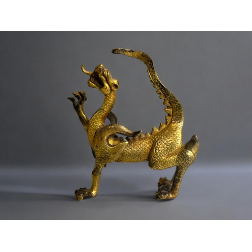 2 - Two Chinese gilt bronze Dragons.In the Tang style.Larger - 29cm longSmaller - 12 x 12cm... 