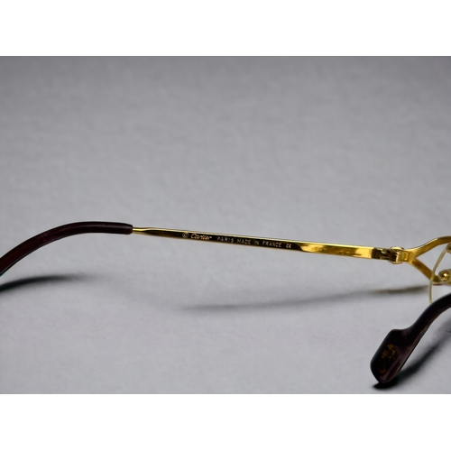 478 - A pair of Cartier Portofino eyeglasses.C 1990s, Gold framed. With original case.