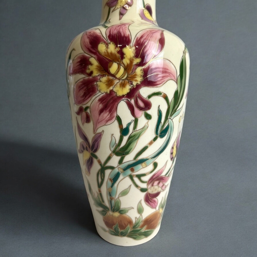 481 - Hand painted Zsolnay Pecs porcelain vase.Foliate design.Height - 27cm