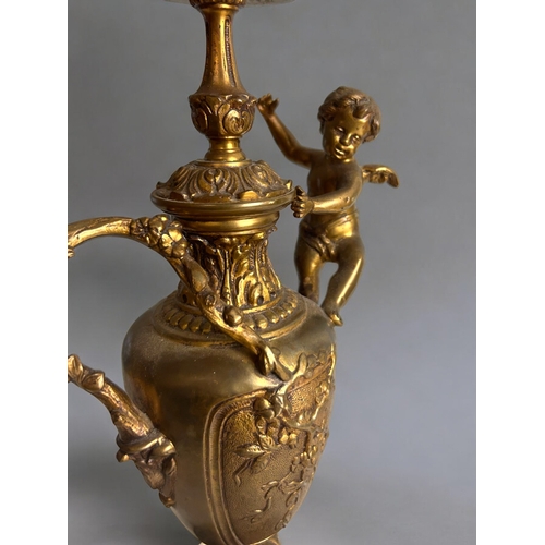 483 - A Vintage gilt metal 'Cherub' table lamp.In the Rococo style, with naturalistic design and mounted c... 