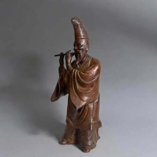 209 - A Japanese patinated 'musician' figure.Meiji / Taisho period.Height - 24.5cm