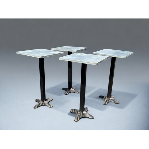 63 - A set of four heavy duty metal topped & cast iron Café bar tables. Height - 106cm