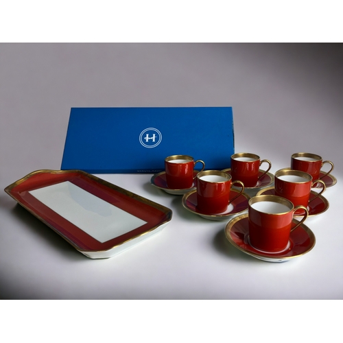 497 - A set of Haviland, Limoges 'Laque de Chine' coffee cups & saucers. Together with a boxed tray.