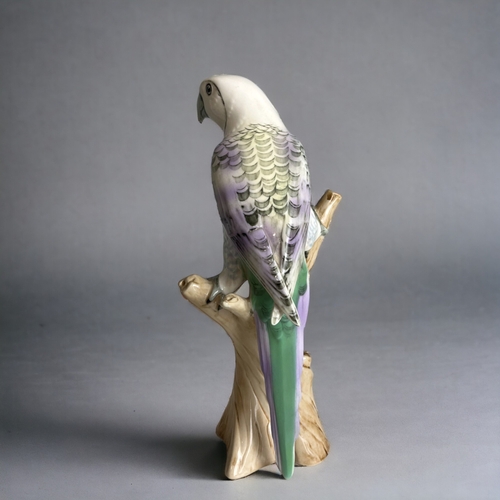 498 - Two Royal Dux porcelain parrots.Hand painted. Designed by V. Daniel. 27cm tall.