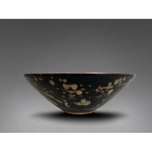 130 - Chinese porcelain Jizhou type bowl.Tortoiseshell design to exterior, with scrolling stylised pattern... 