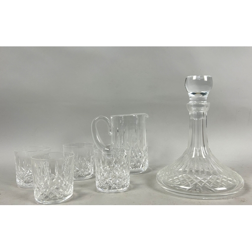 503 - A collection of Waterford 'Lismore' crystal.Including shops decanter, water jug and four whisky tumb... 