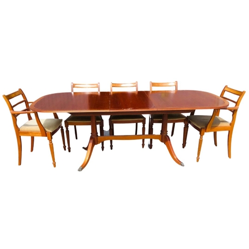 310 - A Large Extendable McIntosh Dining Room Table and 8 Chairs