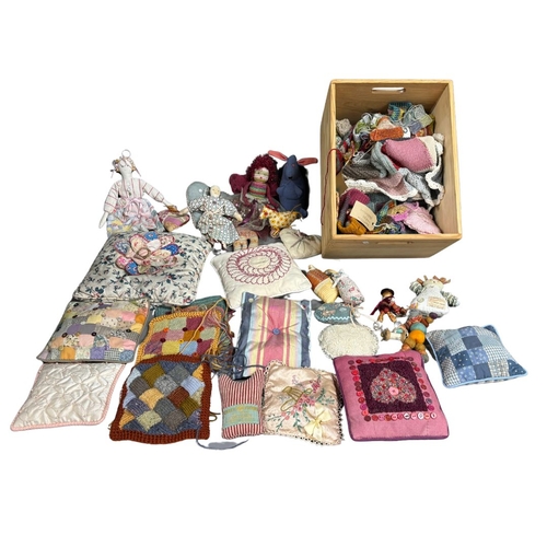 562 - Collection of small cushions, craft items and haberdashery items