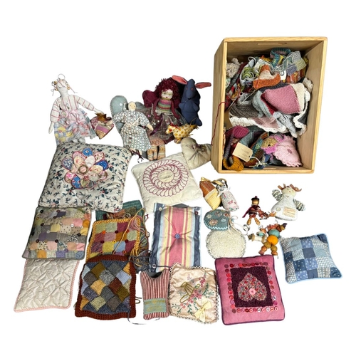 562 - Collection of small cushions, craft items and haberdashery items