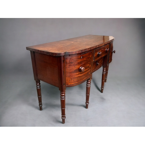 570 - A George III Bow front inlaid Mahogany sideboard. With original fitted lead wine cooler inside right... 