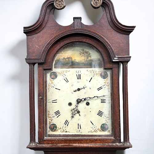 208 - An Oak George III Longcase clock.Arched painted white enamel dial with rural scene and foliate desig... 