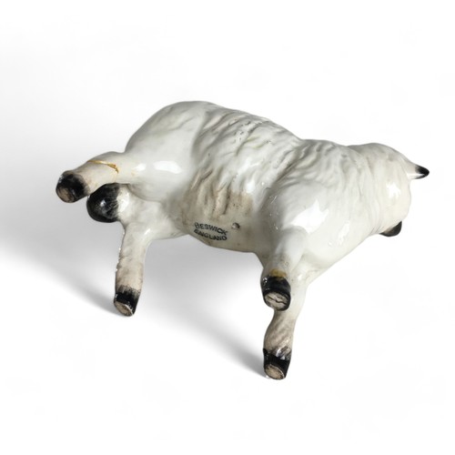 582 - Beswick Sheep and Lambs x 5, and a Sarreguemines Pottery Dolphin Gurgle Style vase.