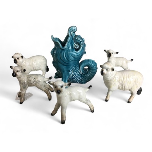 582 - Beswick Sheep and Lambs x 5, and a Sarreguemines Pottery Dolphin Gurgle Style vase.