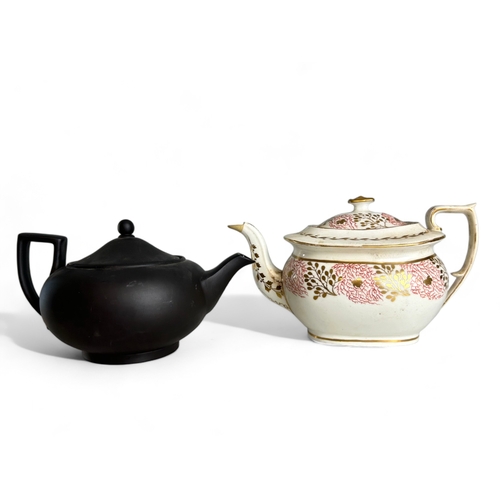 587 - A Georgian English porcelain teapot, possibly by Spode. Circa 1820.Together with a Wedgwood black Ba... 