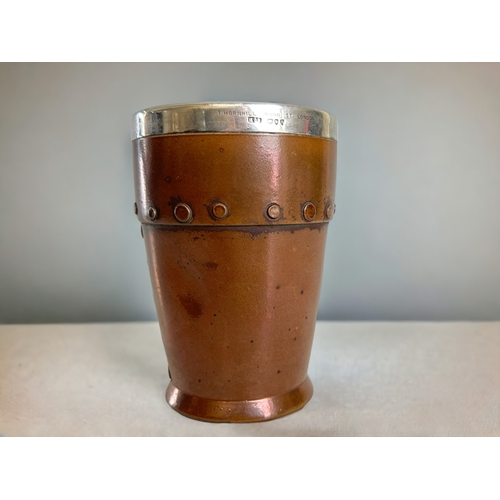 589 - A Royal Doulton Silicon silver rim beaker.With a realistic 'Copper' effect in stoneware. Retailed by... 