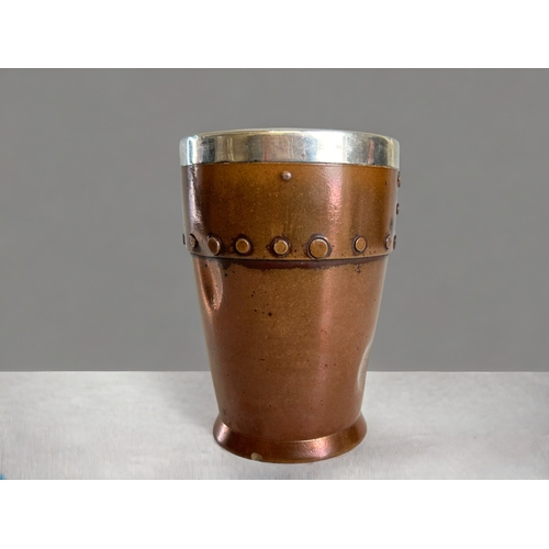 589 - A Royal Doulton Silicon silver rim beaker.With a realistic 'Copper' effect in stoneware. Retailed by... 