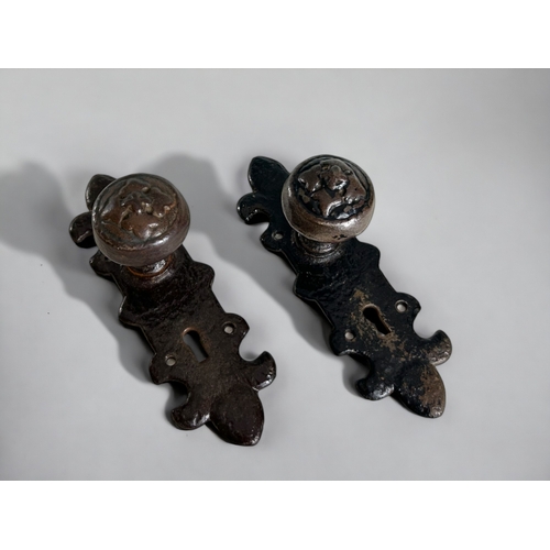 590 - A pair of Kirkpatrick? embossed Mortice cast iron door handles.