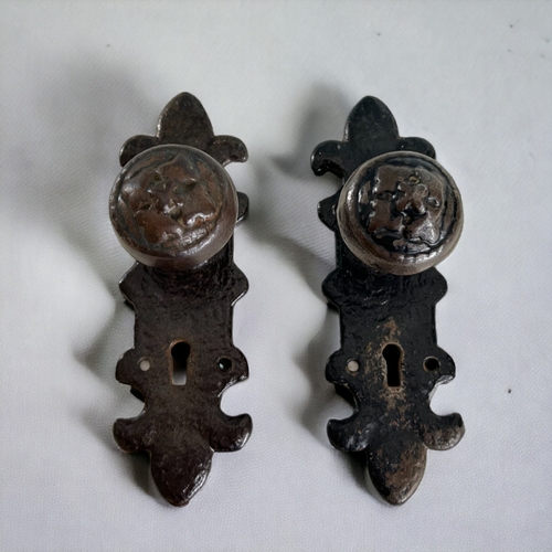 590 - A pair of Kirkpatrick? embossed Mortice cast iron door handles.