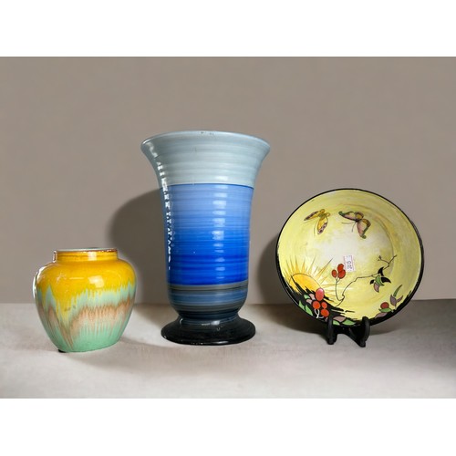 592 - A collection of Shelley China. Including a large banded 'Harmony' vase, dripware Jar and a painted, ... 