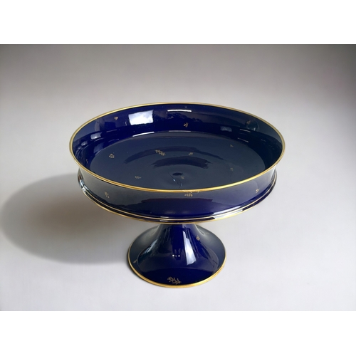 595 - A Sevres porcelain Centre piece / fruit bowl.20th century.Cobalt ground with gilt foliate sprigs and... 