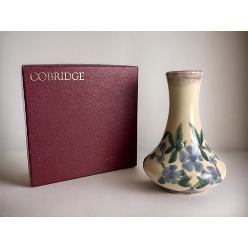 597 - A Boxed Cobridge stoneware 'Periwinkle' vase.Height - 18.5cm