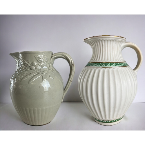 600 - Two 19th century Minton vases.Including 1852 Minton Lismore Parian Pitcher in green & gold colou... 