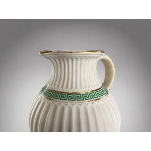 600 - Two 19th century Minton vases.Including 1852 Minton Lismore Parian Pitcher in green & gold colou... 