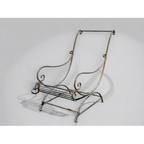 606 - A regency period wrought iron chair.lacking fabric seat.Width - 57cmDepth - 97cmHeight - 93cm... 