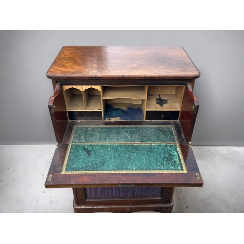 613 - A 19th century Georgian secretaire cabinet.Drop down writing desk with replaced fitted interior. Two... 