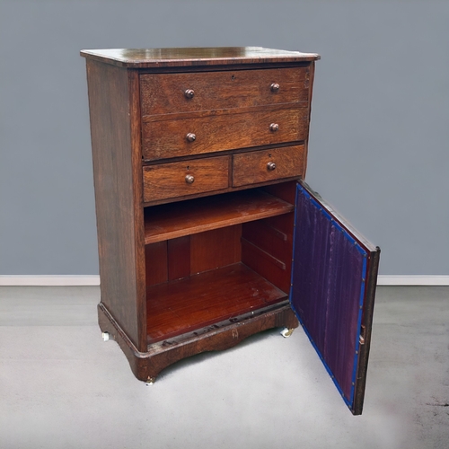 613 - A 19th century Georgian secretaire cabinet.Drop down writing desk with replaced fitted interior. Two... 