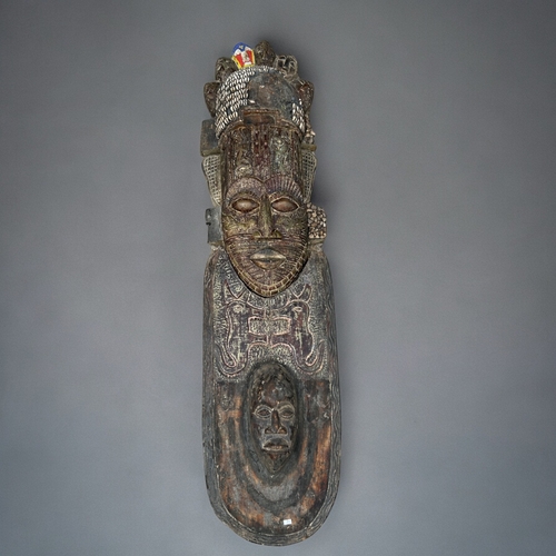 620 - A large two-piece African carved Teak wall mask.Formerly of Shaka Zulu restaurant in London.Height -... 