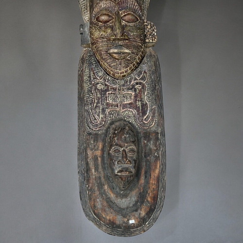 620 - A large two-piece African carved Teak wall mask.Formerly of Shaka Zulu restaurant in London.Height -... 