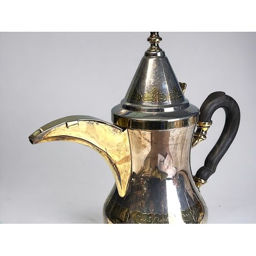 634 - A German 925 sterling silver coffee pot.'Dallah' form, with stylised parcel gilt motifs and spout. M... 