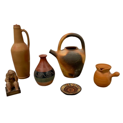 653 - A Collection of Mexican and South American Ethnic pottery Jars Etc and a Figure of a seated man