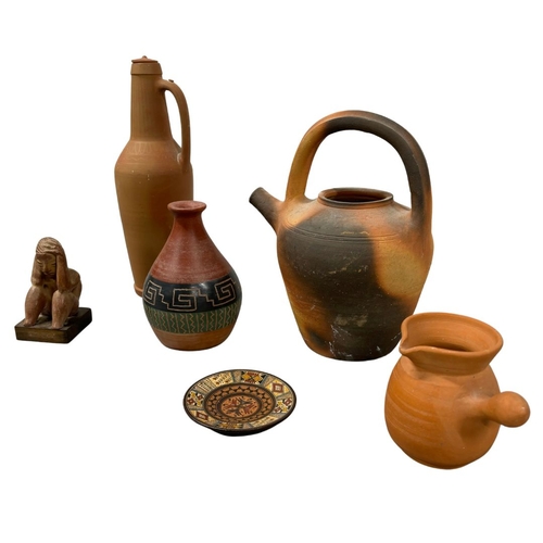 653 - A Collection of Mexican and South American Ethnic pottery Jars Etc and a Figure of a seated man