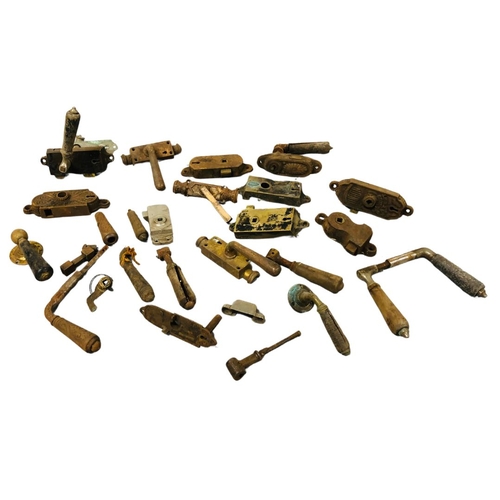 703 - Collection of Victorian brass door handles and accessories